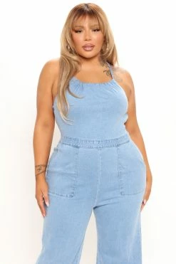 Fashion Nova Jumpsuits Cute Back Story Denim Jumpsuit- Light Blue Wash