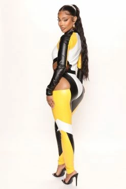 Fashion Nova Ready To Race Leather Jumpsuit - Black/Yellow Jumpsuits
