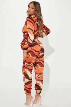 Fashion Nova Penelope Printed Jumpsuit - Rust/combo