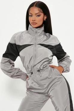 Fashion Nova Jumpsuits Out On The Track Windbreaker Jumpsuit - Silver
