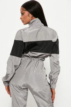 Fashion Nova Jumpsuits Out On The Track Windbreaker Jumpsuit - Silver