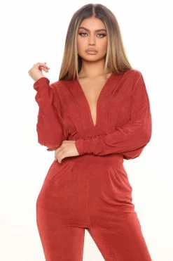 Fashion Nova Sierra Slinky Jumpsuit - Rust Jumpsuits