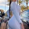 Fashion Nova Frisky Feline Jumpsuit - Ivory Jumpsuits