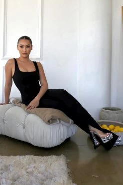 Fashion Nova Love Evolution Sleeveless Jumpsuit - Black Jumpsuits